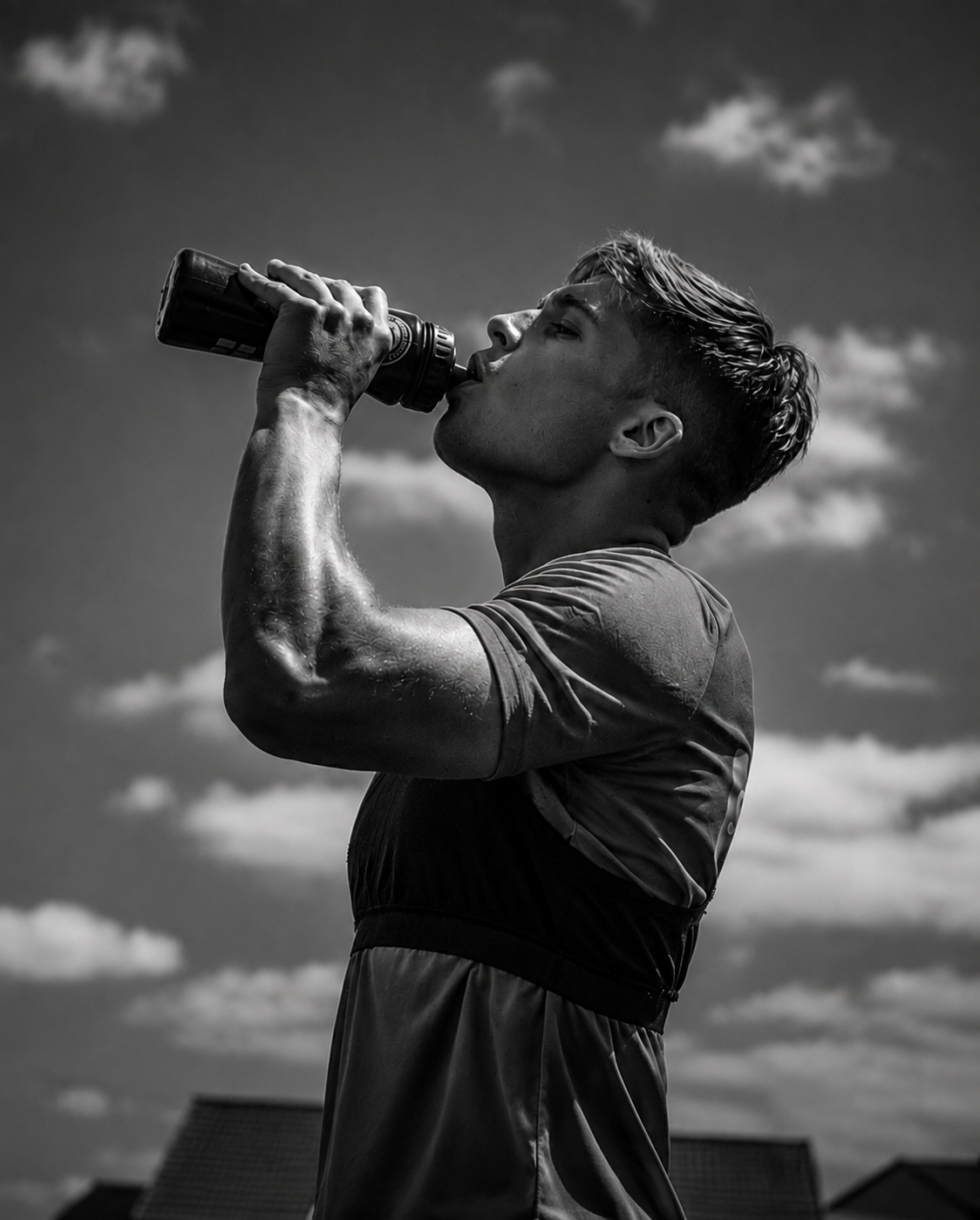 Bailey Smith, performance coach and footballer, rehydrating after a match